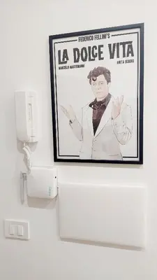 a picture of a doctor on a wall at Mimmi's house in Rome