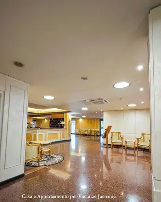 a large room with a kitchen and a living room at Casa e Appartamento per Vacanze JASMINE in Rome