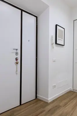a room with white walls and a sliding door at DaliTourism - La Casa di Pida Vatican Apartment in Rome
