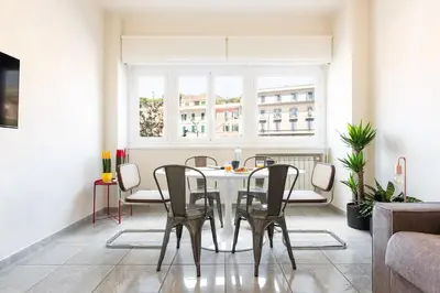 a dining room with a table and chairs at Vatican Loft - San Pietro in Rome