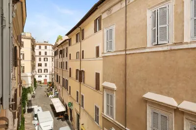 a view of an alley between two buildings at Crystal Home Piazza Navona in Rome