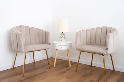 two chairs and a side table with a lamp at Appartamento con 2 camere e 2 bagni -San Giovanni- in Rome