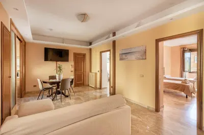 a living room with a couch and a table at Apartment27 Roma in Rome