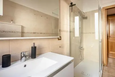 a bathroom with a sink and a shower at Apartment27 Roma in Rome