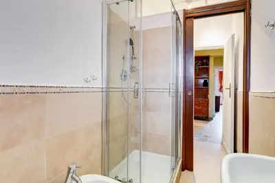 a bathroom with a shower and a sink at The Pope's Oasis near Trastevere and Historical Center in Rome