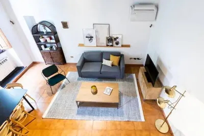 a living room with a couch and a table at Navona in Love in Rome
