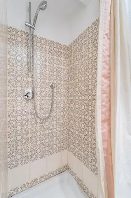 a bathroom with a shower with a tub at Flaminio Garden, Indenpent Flat 10 min from the City Center in Rome