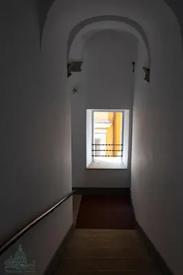 a hallway with a window in a building at Domus in Lauro in Rome
