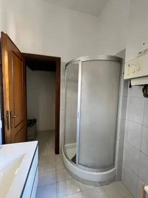 a bathroom with a shower and a sink at Home Rome in Rome