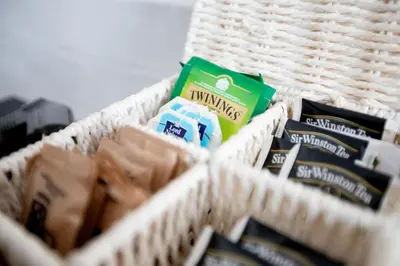 a basket filled with different types of toothpaste at Maison Margaret in Rome