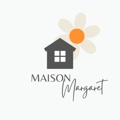a house with a flower and the words mission margaritas at Maison Margaret in Rome