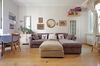 a living room with a couch and a table at Cozy Esquilino - My Extra Home in Rome