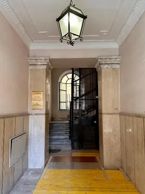 an entrance to a building with a black door at Washington TownHouse - Roma Statuto in Rome