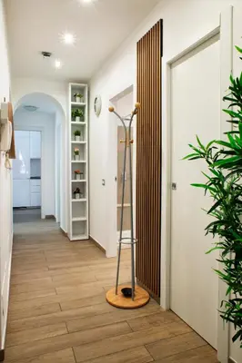 a hallway with a door and a floor at Washington TownHouse - Roma Statuto in Rome