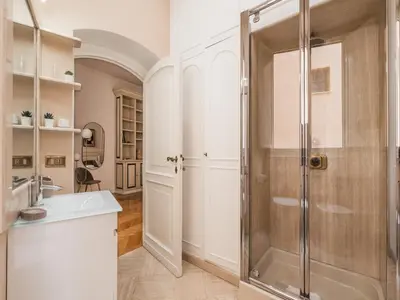 a bathroom with a shower and a sink at The Best Rent - Splendid three-bedroom apartment near the Trevi Fountain in Rome