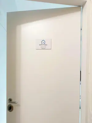 an open door with a sign on it at RomeCornelia Apartment - Musei Vaticani - San Pietro in Rome