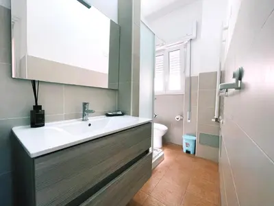 a bathroom with a sink and a toilet at Bella Boutique in Rome