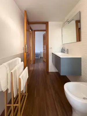 a bathroom with a sink and a mirror at Trastevere Station House in Rome