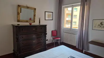 a bathroom with a tub with a glass shower at Via Tiburtina vicino Università e Stazione intero appartamento per la tua vacanza a Roma in Rome