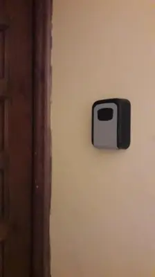a black and white object on the side of a wall at Imperial Rome Accommodation terrazza sul vaticano in Rome