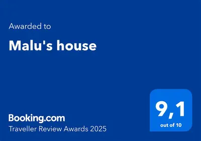 a blue screen with the text mailed to mililux house at Malu's house in Rome