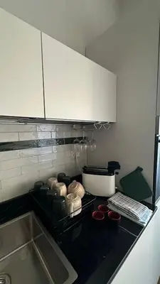 a kitchen with a sink and a counter top at A casa di Edo in Rome