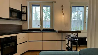 a kitchen with a sink and a counter top at Chic Studio in piazza Bologna in Rome