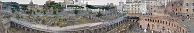 an aerial view of a city with buildings at colosseobb in Rome