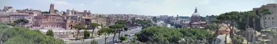 a view of a city with buildings and a street at colosseobb in Rome