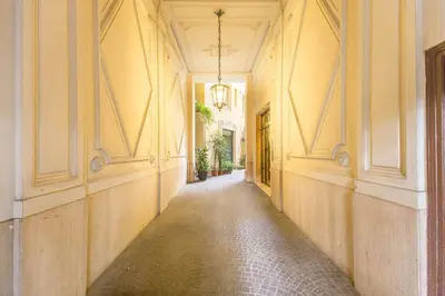 an empty corridor of a building with at Elegant Flat Spanish steps in Rome