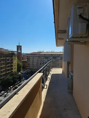a balcony of a building with a view of a city at Le tue vacanze a Roma-2 bagni-nuovo apt in Rome