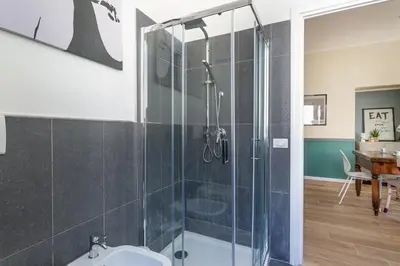 a bathroom with a shower and a sink at iFlat Retro Style Apartment near the Vatican in Rome