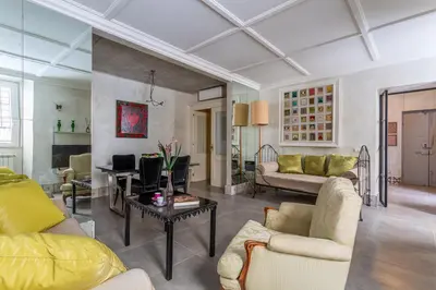 a living room with two couches and a table at iFlat Baroque Apartment in Campo de' Fiori in Rome