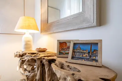 a room with a white air conditioner on the ceiling at Vatican Borgo Pio Splendid Apartment in Rome