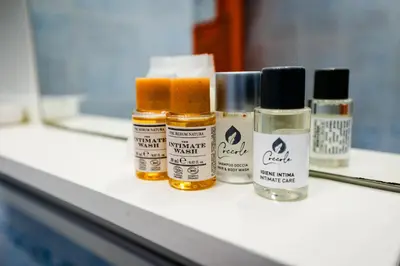 four bottles of essential oils sitting on a counter at Orange Nest in Rome