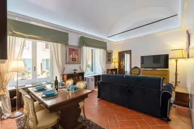 a living room with a couch and a table at Anima Beauty House in Rome