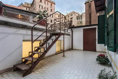 a staircase on the side of a building at Roma Capoccia in Vaticano in Rome