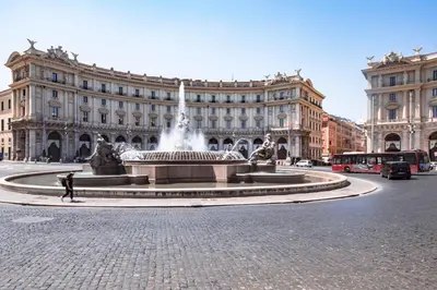a fountain in front of a large building at Roof Terrace Sophie, Repubblica apartment Termini Station in Rome