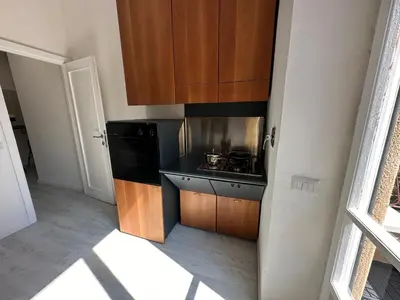 a kitchen with a sink and a stove at St Pietro city center near subway in Rome