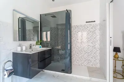 a bathroom with a sink and a shower at iFlat Cozy and Elegant apt near Spanish Steps in Rome