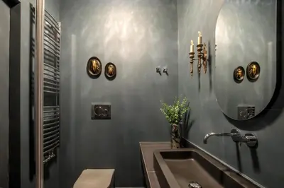 a bathroom with a sink and a mirror at Daplace - Lavinia Apartment in Rome