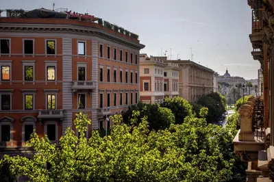 a view of a city with buildings and trees at Daplace - Lavinia Apartment in Rome
