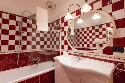 a bathroom with a sink and a mirror at Villa Aureliana with pool near San Peter in Rome