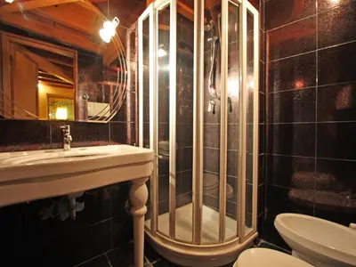 a bathroom with a shower and a sink and a toilet at Domus Navona Pantheon in Rome