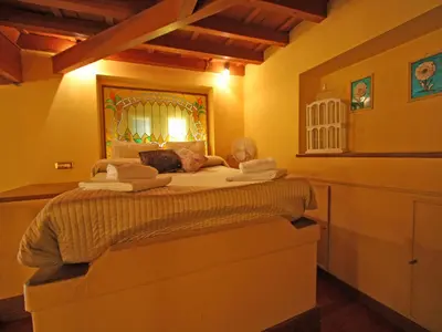 a bedroom with a bed with towels on it at Domus Navona Pantheon in Rome