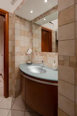 a bathroom with a sink and a mirror at Francesco Terrace - Piazza Bologna, Rome in Rome