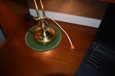 a tea kettle sitting on a table next to a laptop at Vacanze Romane in Rome