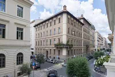a large building in the middle of a city at MysuiteRome in Rome