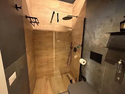 a bathroom with a shower with a toilet at Lary's - Vaticano in Rome