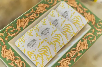a couple of cards sitting on top of a table at Coppede' Penthouse in Rome